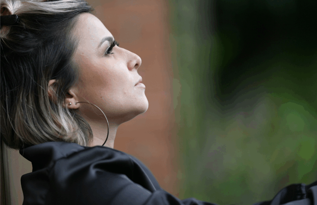 A woman contemplating about eating disorder support in leesburg, va.